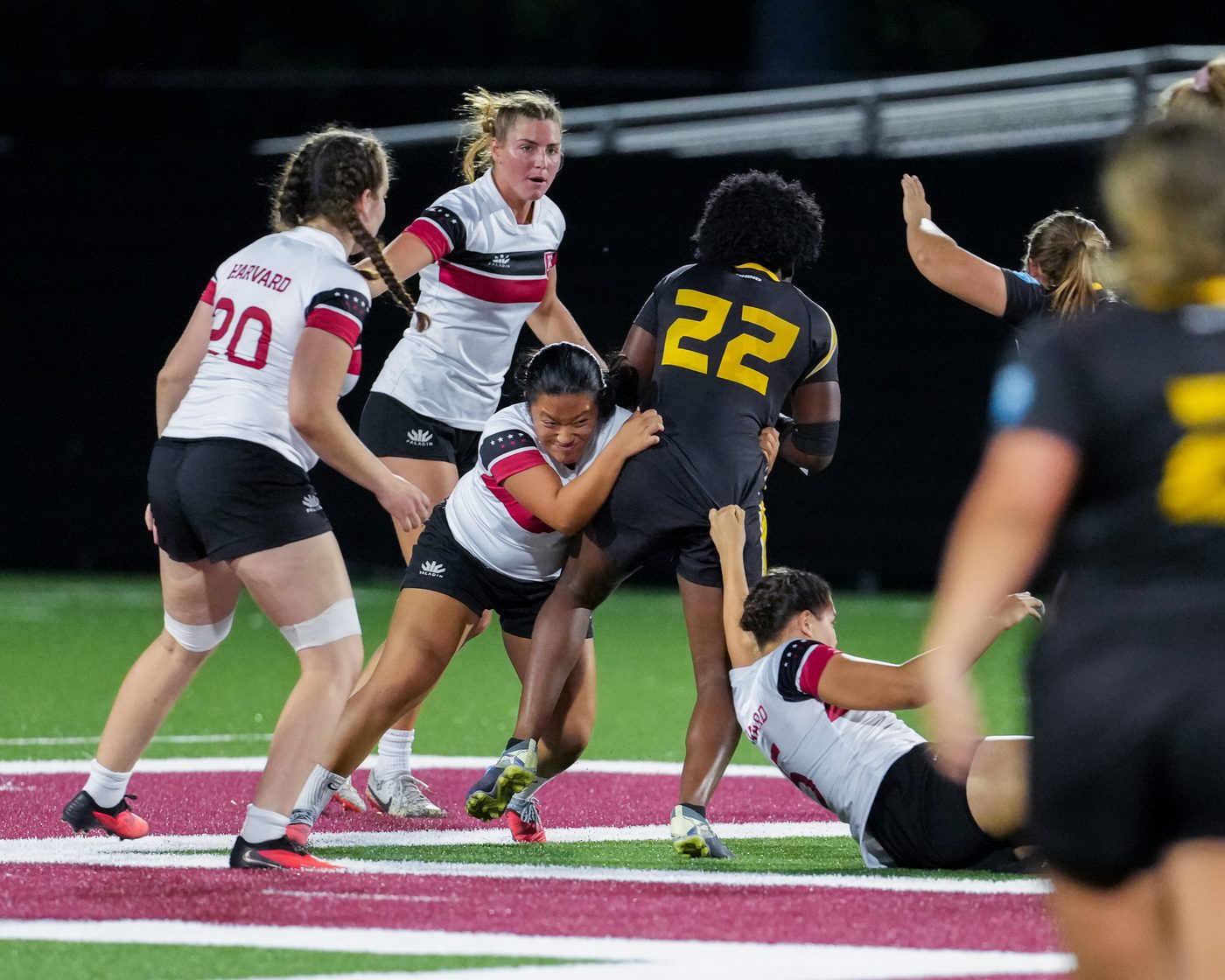 Sofia celebrating with her Harvard rugby teammates
